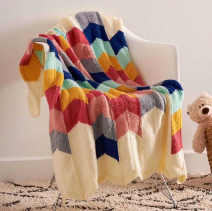 Bernat Chevron Panel Knit Baby Blanket by Yarnspirations