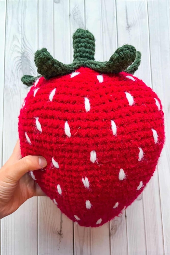 Crochet Strawberry Pillow Pattern by The Caffeinated Snail