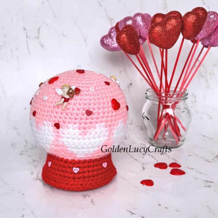 Image for Crochet Valentine’s Day Snow Globe Amigurumi by Golden Lucy Crafts