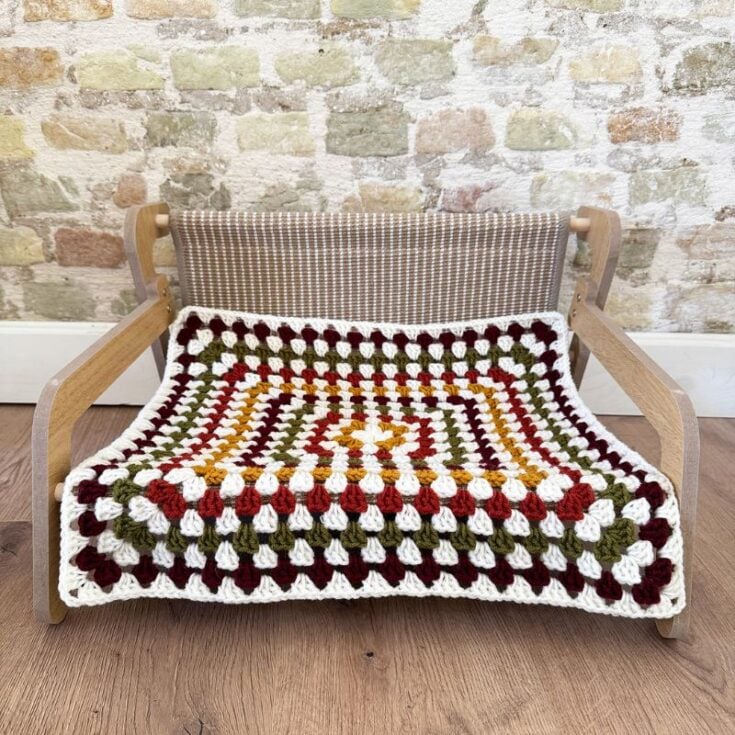 Crochet cat blanket on chair