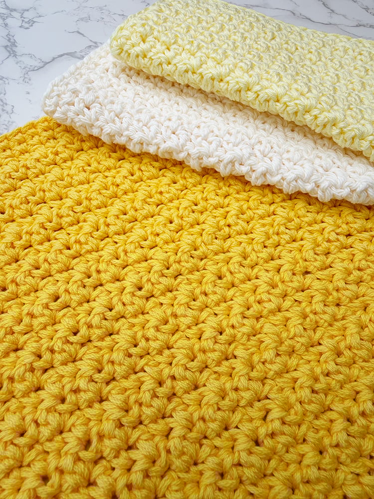 Crochet lemon peel stitch close up detail of three dishcloths