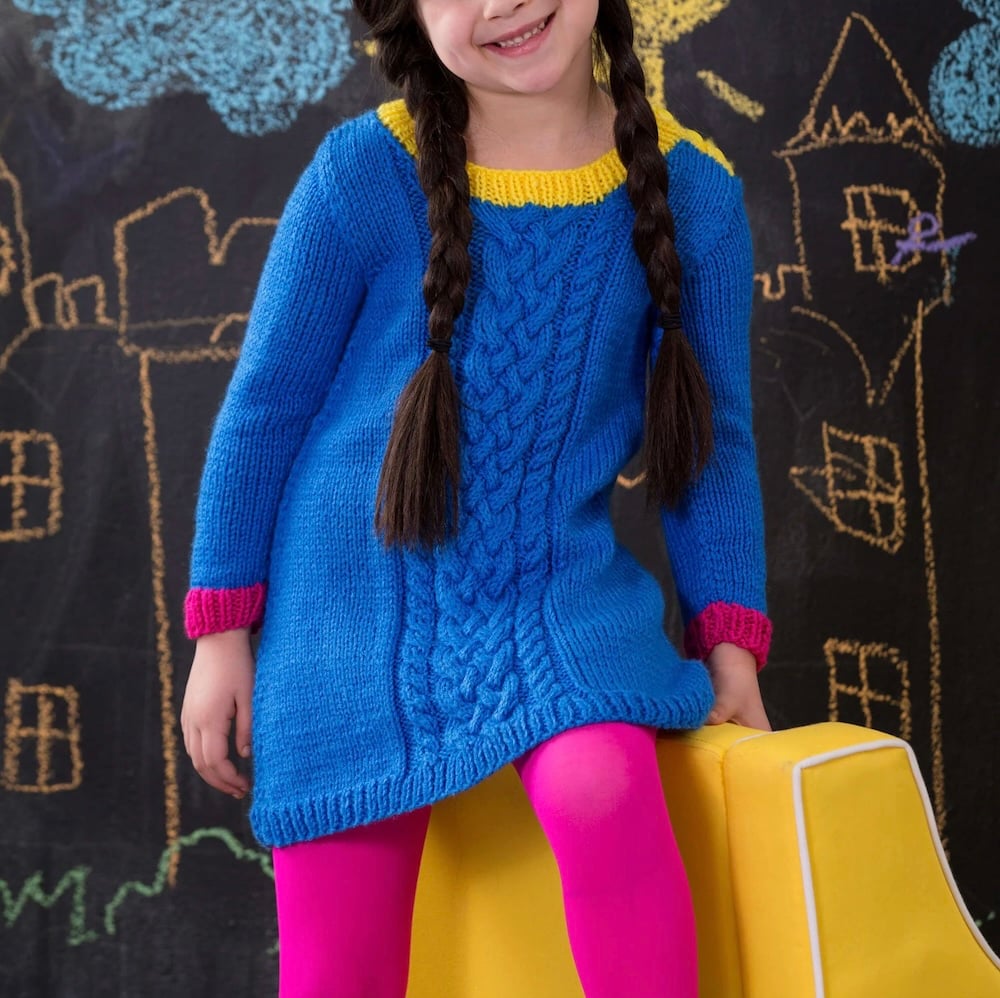 Free Red Heart Knit Girl&rsquo;s Cabled Dress Pattern by Yarnspirations