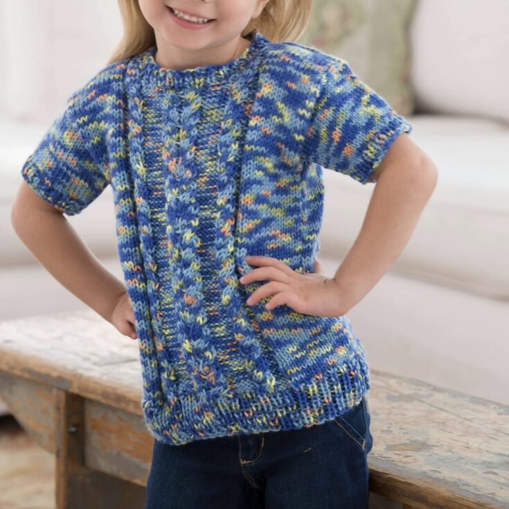 Girl’s Knit Cable Sweater by Red Heart Yarn