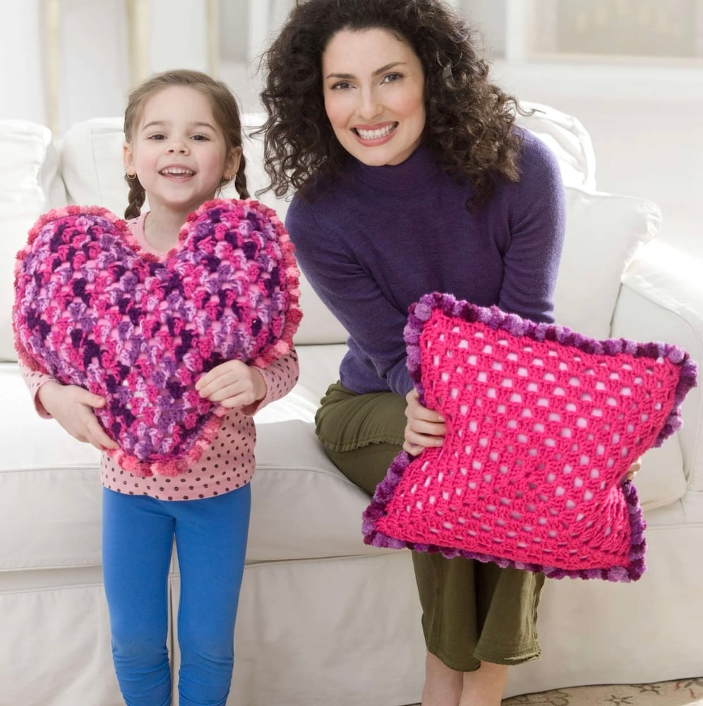 Red Heart Crochet Pillow Party by Yarnspirations